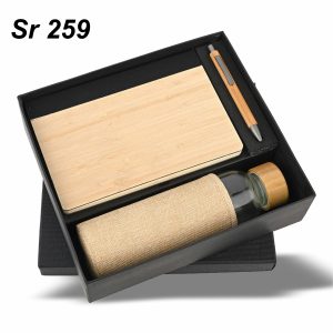 3-in-1 Eco Bamboo Gift Set that includes a bamboo notebook, a wooden pen, and a glass water bottle with a jute sleeve